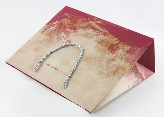 Прокатанная штейном милая упаковка подарка кладет бумагу в мешки искусства 250ГСМ с ручками ПП