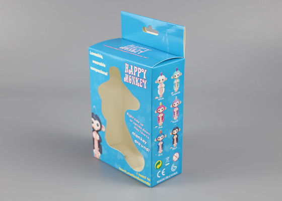 Лоснистым упаковка напечатанная слоением кладет игрушки в коробку упаковывая с пластиковым окном